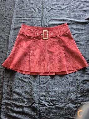 Red Suede Bebe Pleated Skirt with Gold Buckle